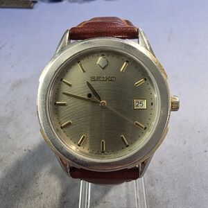 Seiko Silver and Brown Timepiece